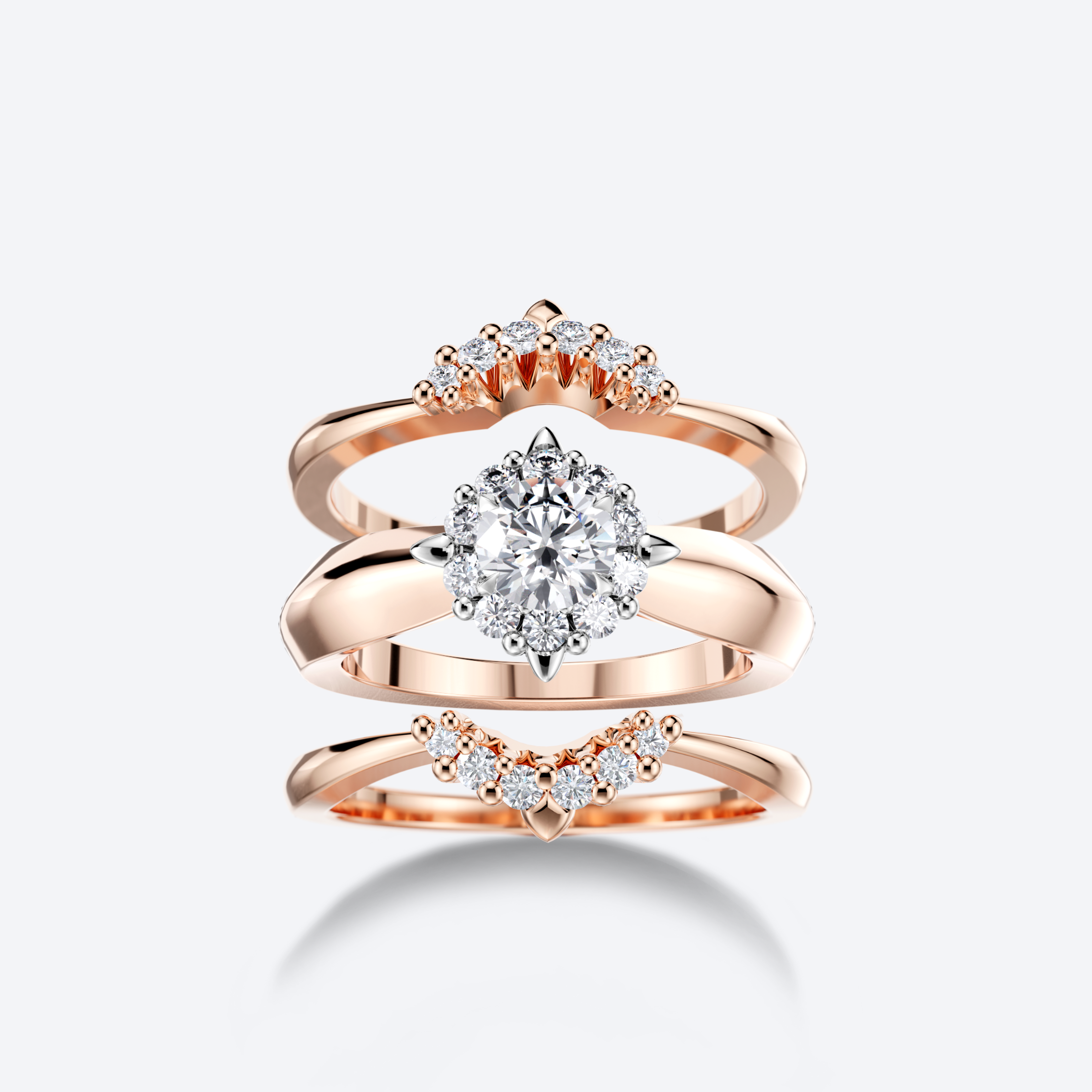 OJL Kide-sormusyhdistelmä 0.50 ct timantilla ja syleilijät, ruusukultaa, lähikuva valkoisella taustalla