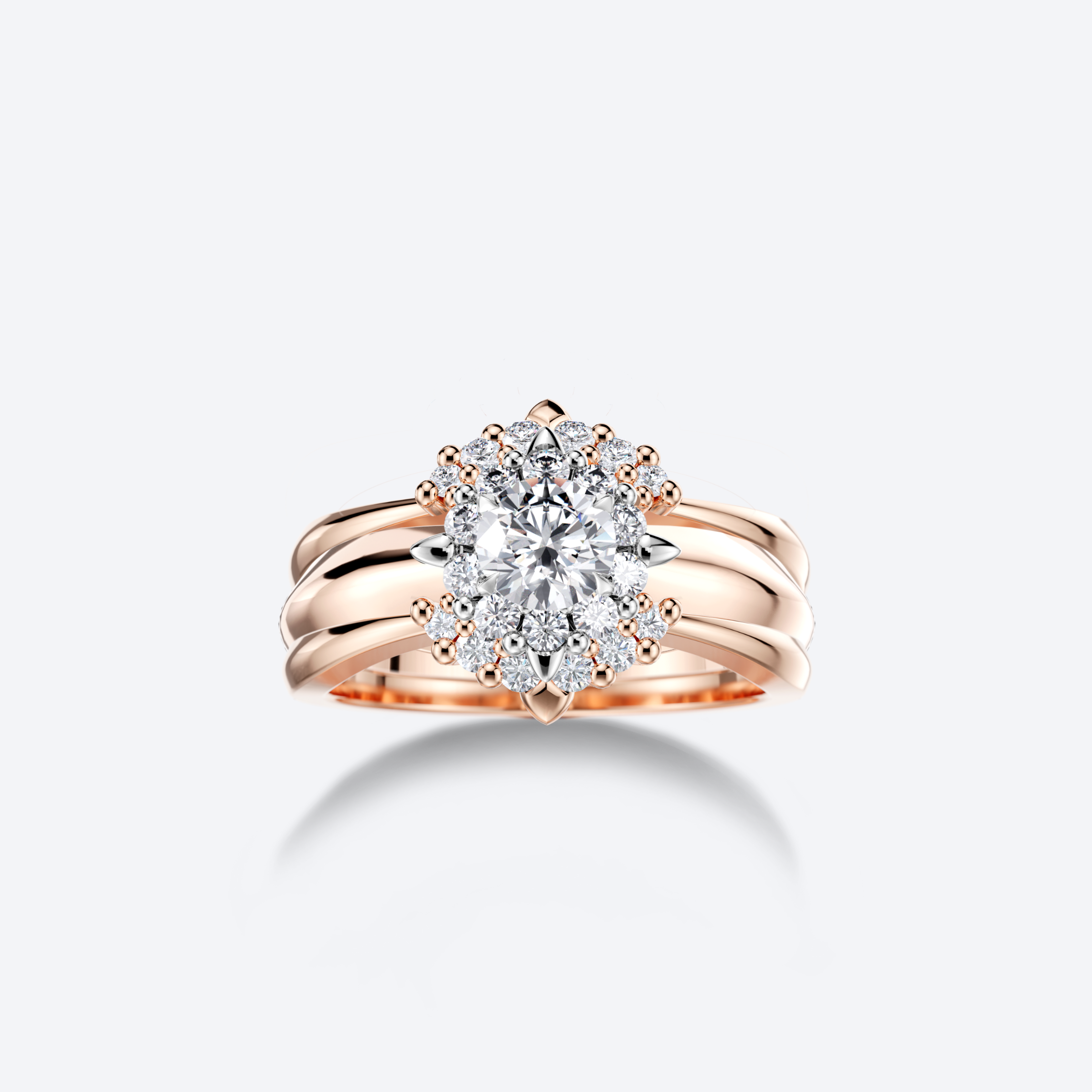 OJL Kide-sormusyhdistelmä 0.50 ct timantilla ja syleilijät, ruusukultaa, lähikuva valkoista taustaa vasten