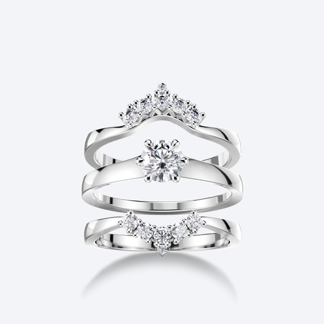 OJL Lumi Syleilijät-sormusyhdistelmä, valkokultaa ja timantteja, lähikuva