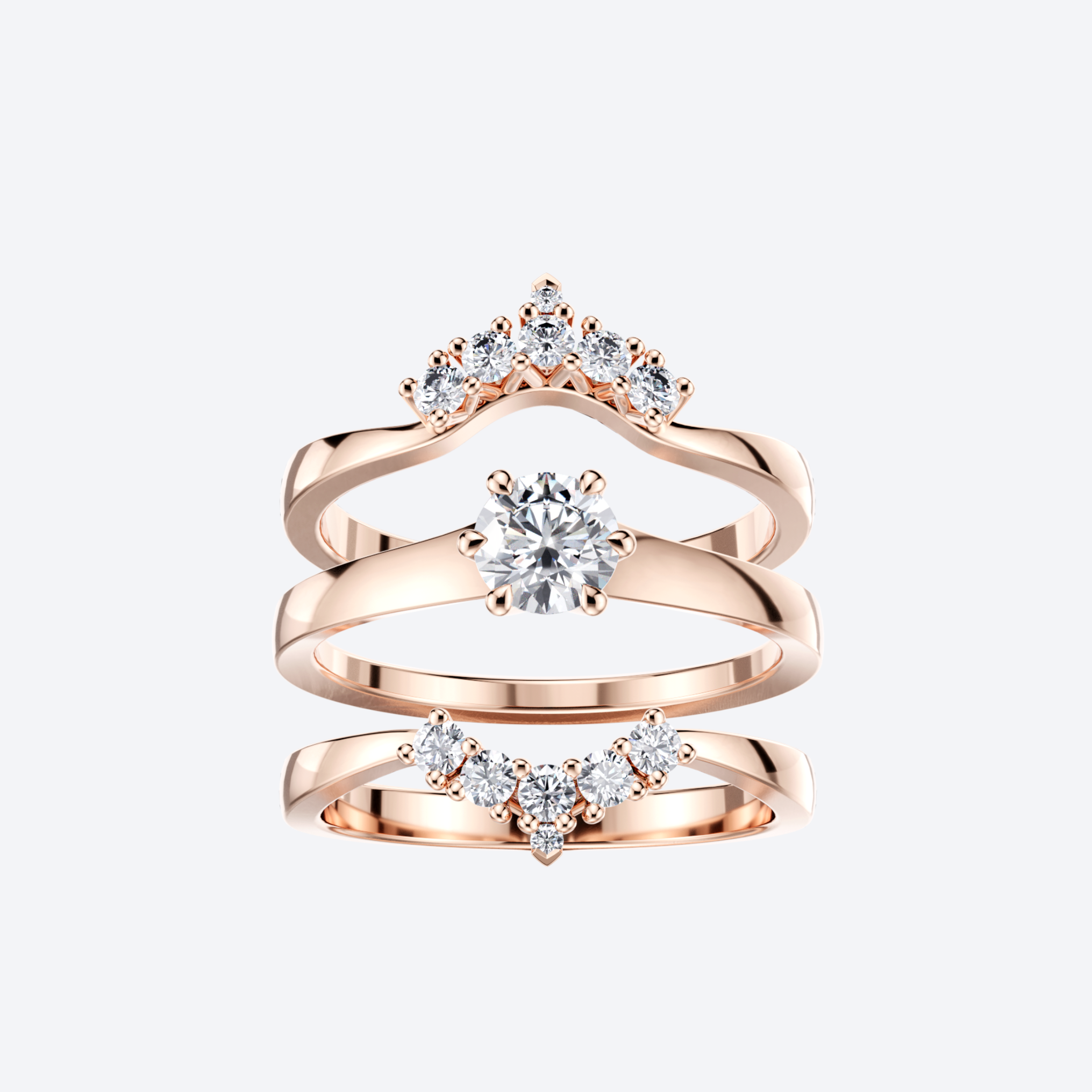 Kaksi Lumi Syleilijä-sormusta punakultaa, 0,10 ja 0,13ct timantteja, yhdistelmä